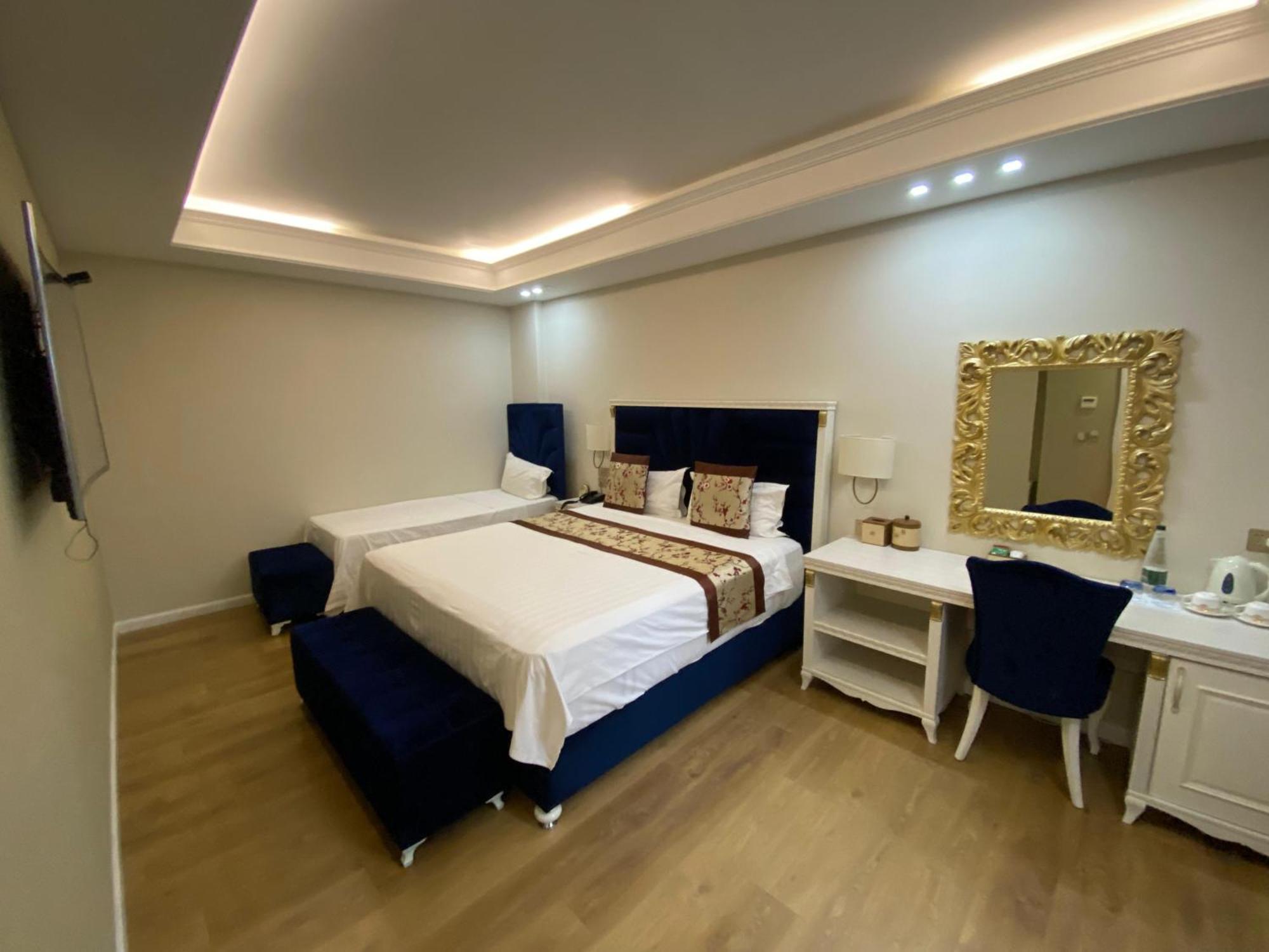 Deluxe Triple Room French Balcony