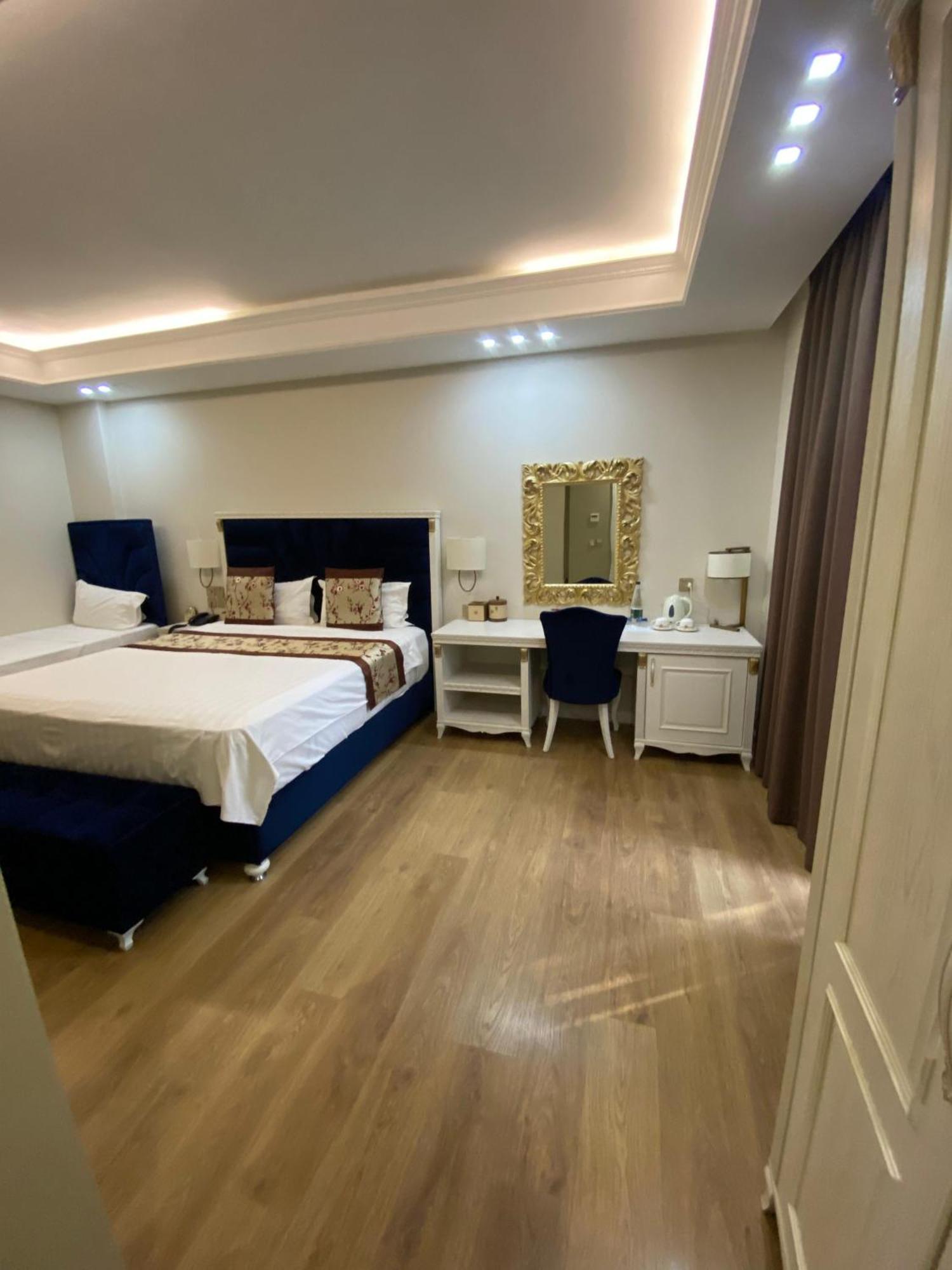 Deluxe Triple Room French Balcony
